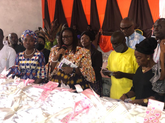 The Registrar, LBNM Board members and Secretariat pay tribute to the Board Chair as he buries his wife in Gbarnga at the Gbarnga Central SDA church.